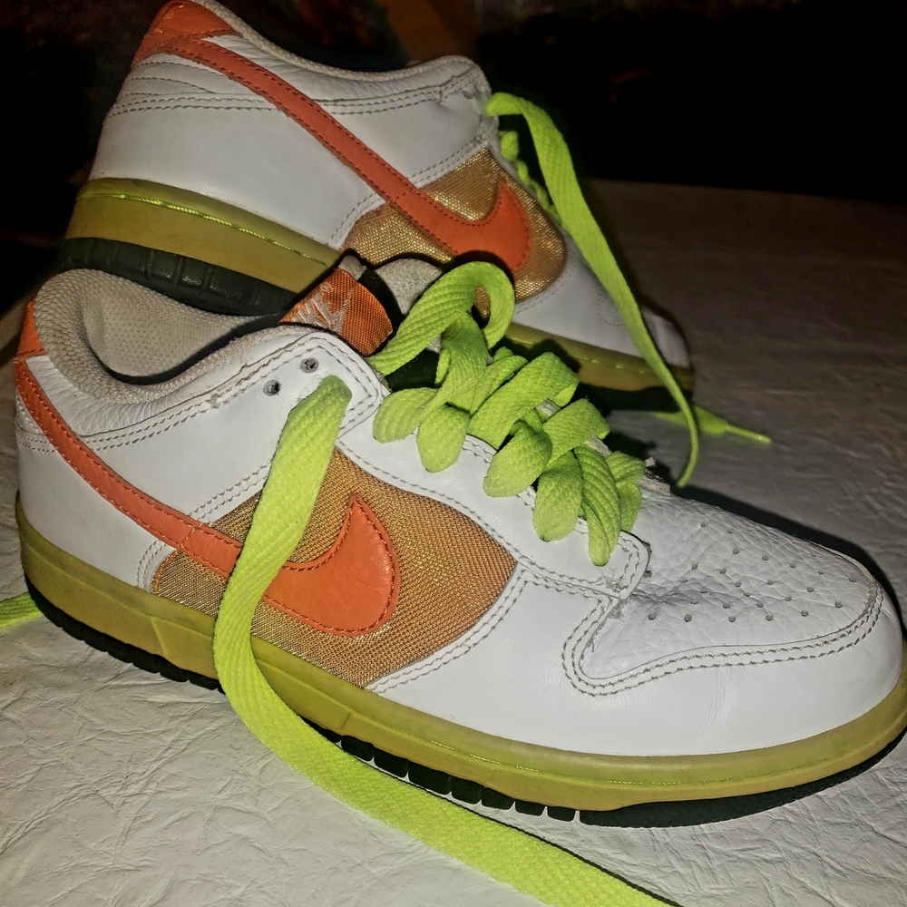 Nike White and Orange Sneakers with Vibrant Design